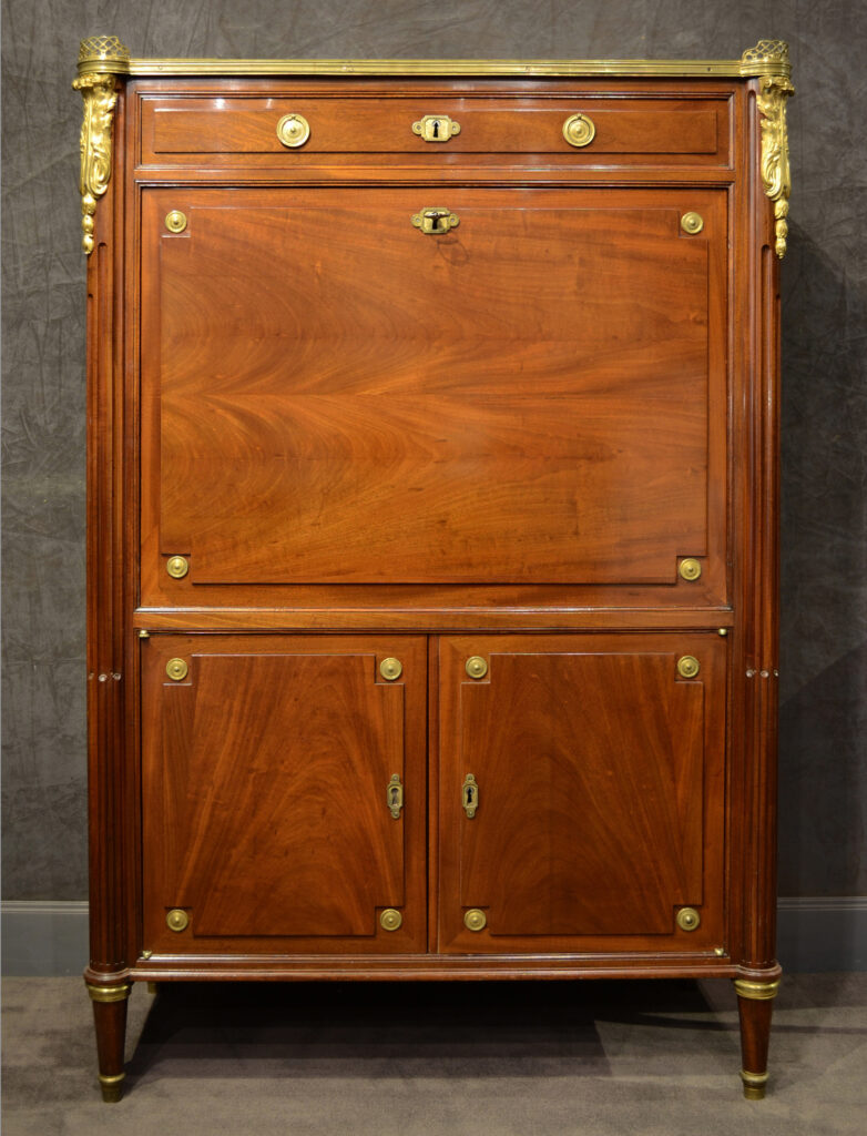 A Louis XVI  mahogany secretaire by Pierre Garnier