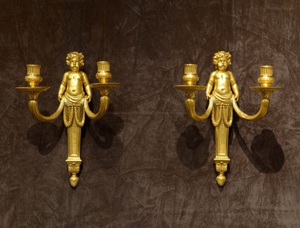 A pair of Louis XVI ormolu sconces